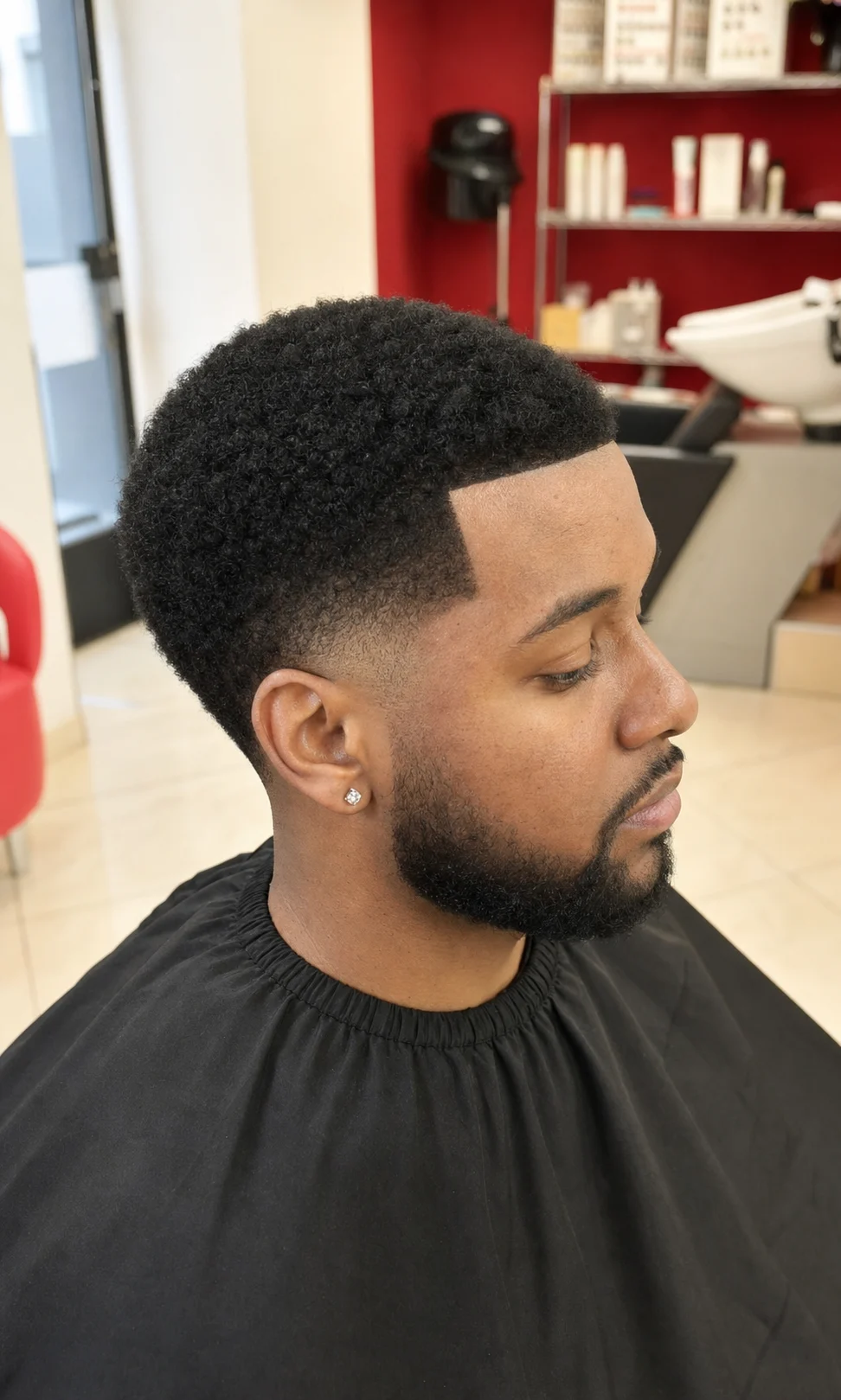 Sfumatura afro uomo con linea pulita a La Chic Sondrio